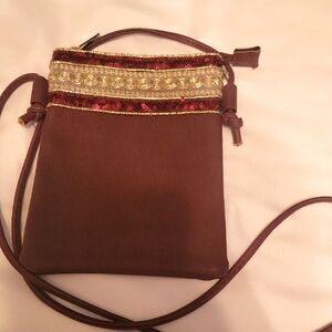 Elegant Burgundy Crossbody Bag with Gold Accents